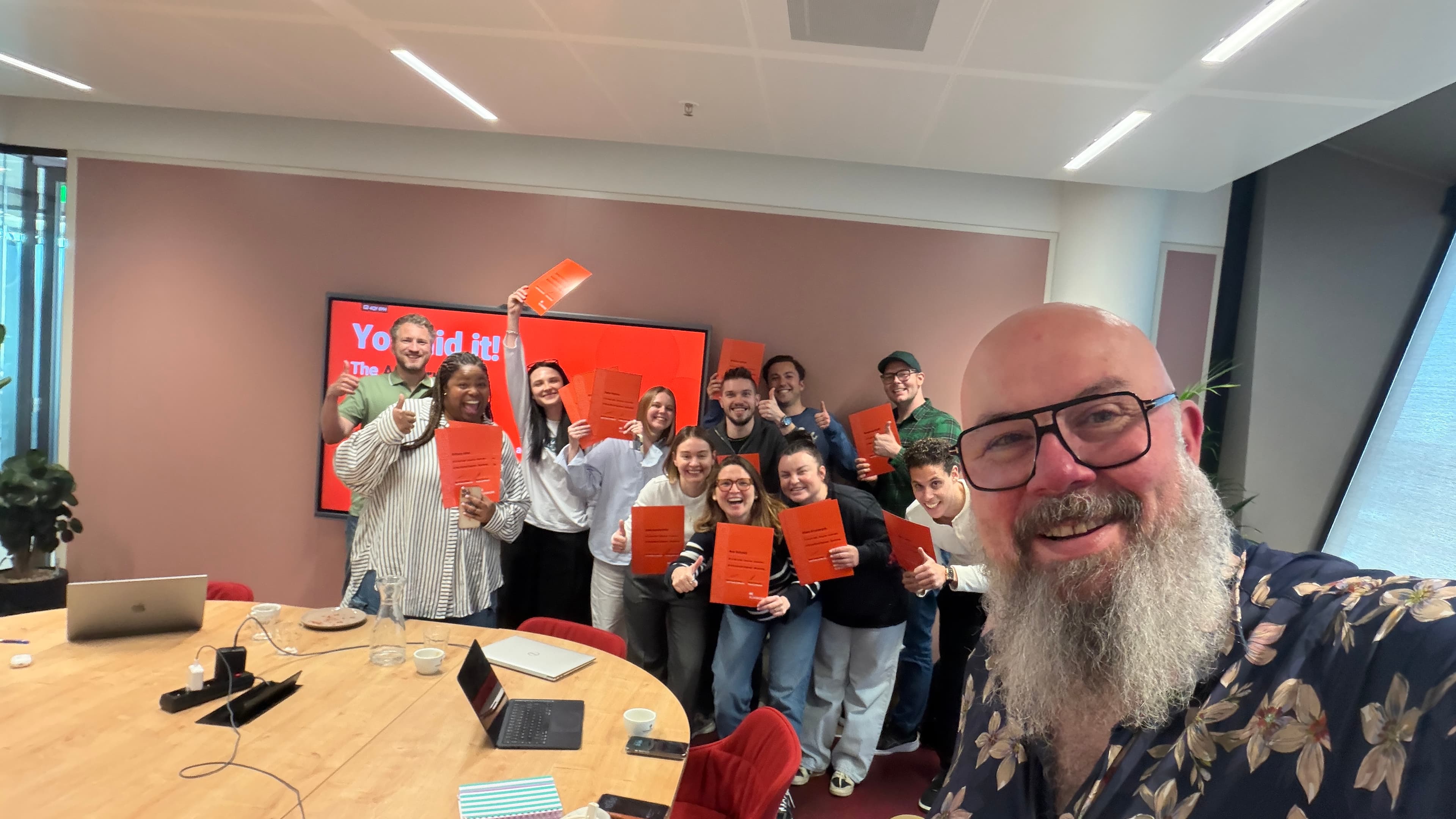 Recruitment team celebrating after two days of building their own AI workflows